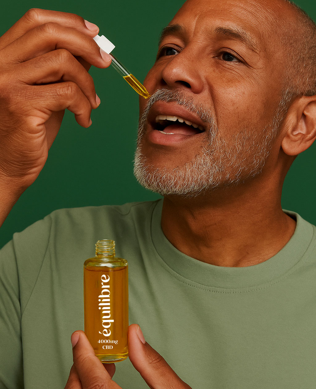 Homme prenant du cbd en huile sublinguale